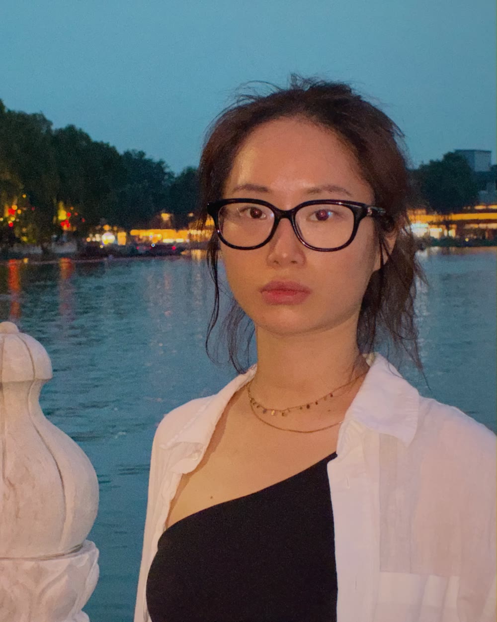 A SNAP '98 print: a portrait by the river at dusk, warm and grainy.